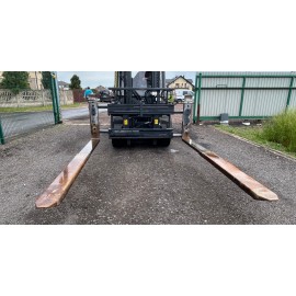 Pozycjoner wideł z widłami teleskopowymi Griptech